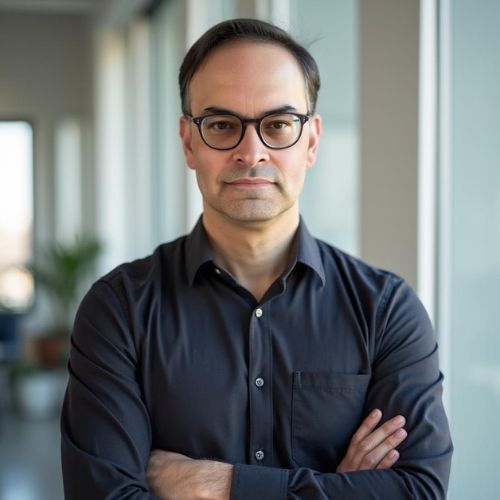 Dr. Karim Godamunné